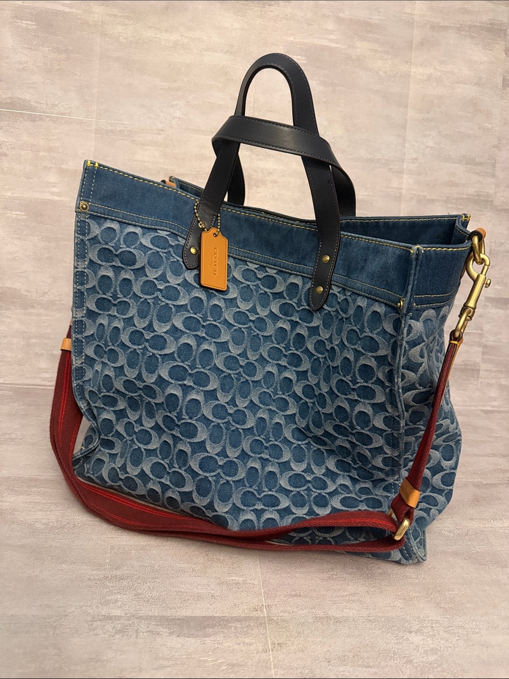 Coach Denim Signature Tote with Navy Blue Handles and Red Strap